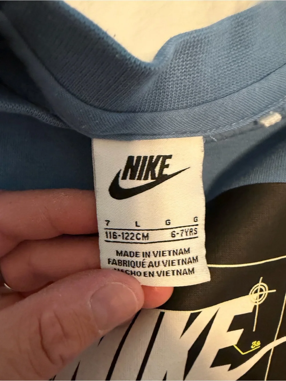 Nike Light Blue Graphic Tee with Black Swoosh